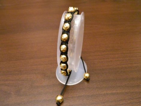 Bratara handmade cu pietricele tip swarovski aurie