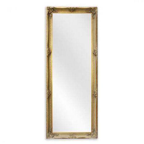 Oglinda mare cu o rama aurie cu decoratiuni