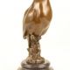 Bufnita- statueta din bronz pe un soclu marmura