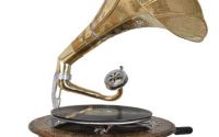 Gramofon rotund cu decoratiuni metalice aurii