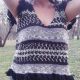Knitted top with fancy accesories