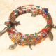 bratara boho multicolora cu charmuri patinate