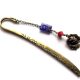 semn de carte cu howlite rosu