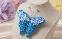 Brosa fluture albastru