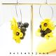 Cercei handmade cu flori galbene si margele de sti